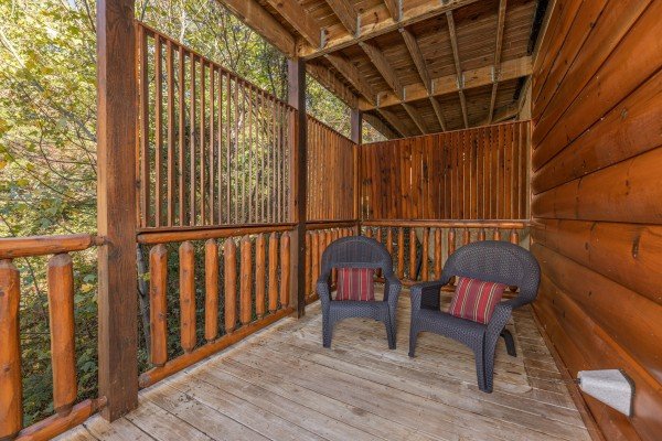 Privacy fence and deck chairs at Bears Don't Bluff, a 3 bedroom cabin rental located in Pigeon Forge